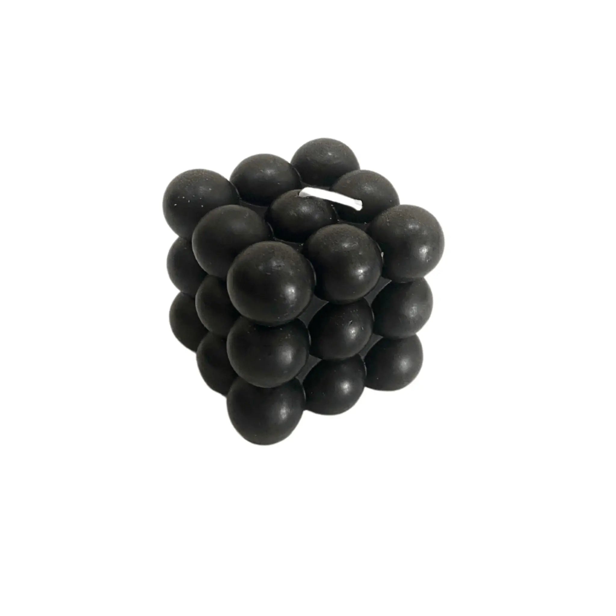 Bougie parfumée noire en forme de bulles pour une ambiance élégante et mystérieuse.