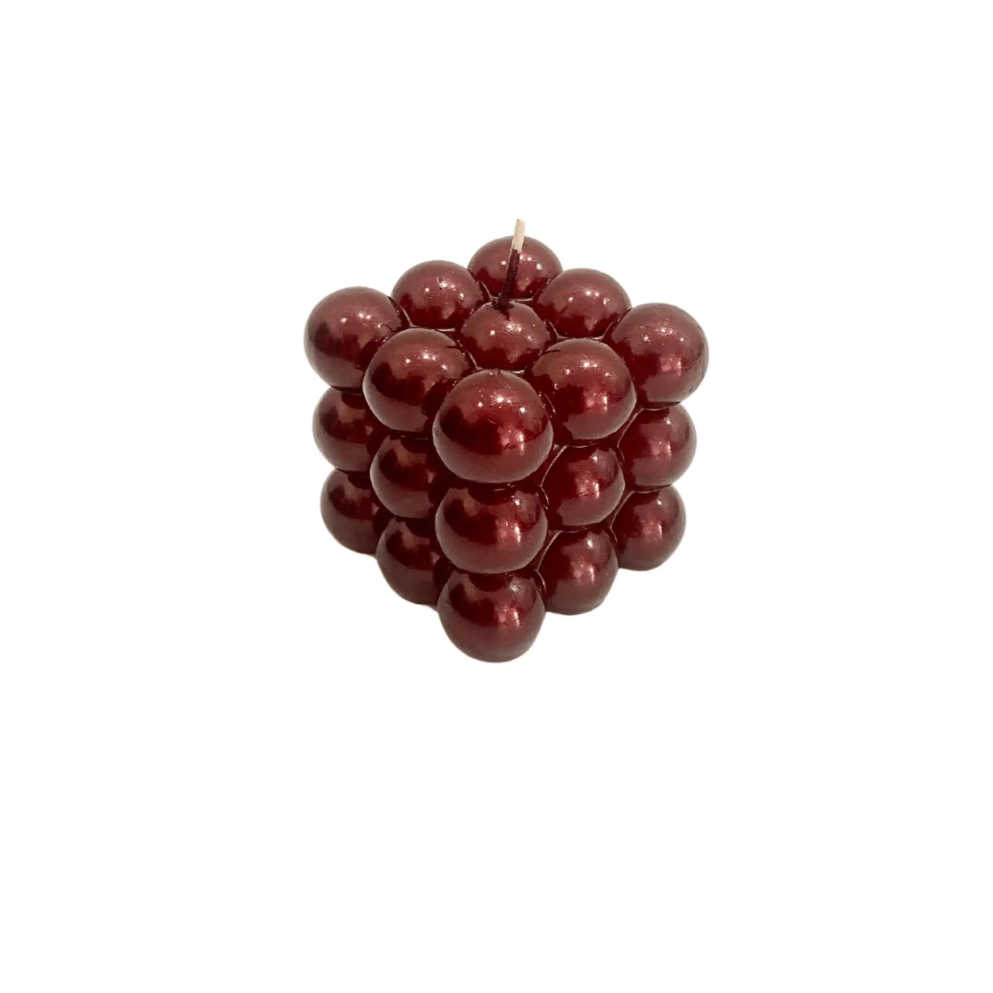 Bougie parfumée rouge en forme de bulles, idéale pour créer une atmosphère romantique et chaleureuse.