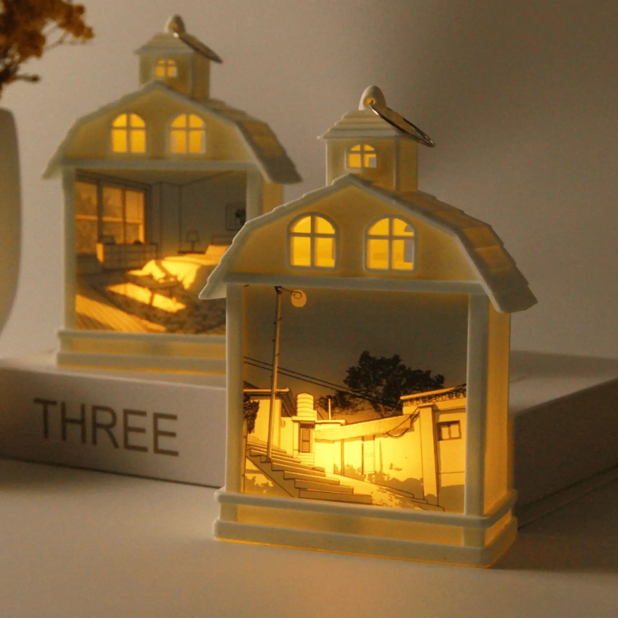 Lampe LED maison décorative affichant une illustration intérieure éclairée par LED, parfaite pour une ambiance cosy dans votre intérieur.