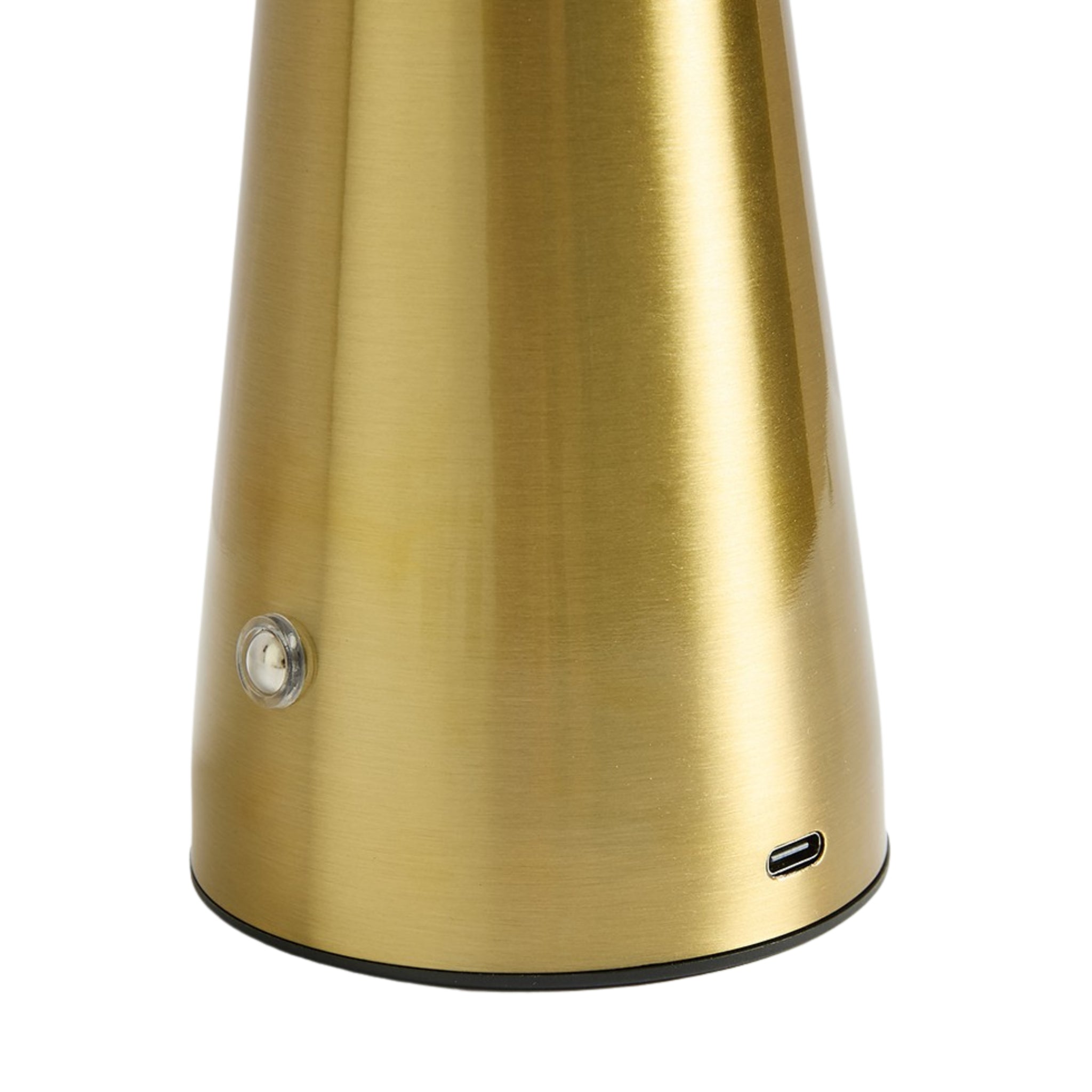 Gros plan sur la base d'une veilleuse LED dorée, montrant le port de chargement USB, en Tunisie.