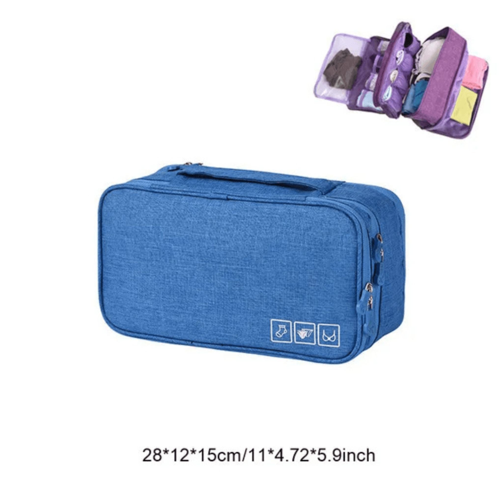 Sac de rangement bleu avec une capacité de 28x12x15 cm, idéal pour organiser et transporter des vêtements. Doté de compartiments multiples et de poignées robustes pour une utilisation pratique en voyage.