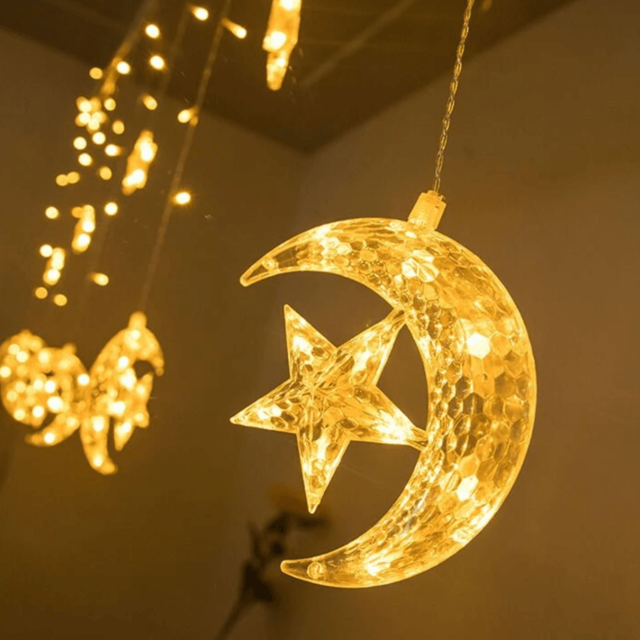 Guirlande LED décorative étoile et lune, parfaite pour créer une ambiance magique.