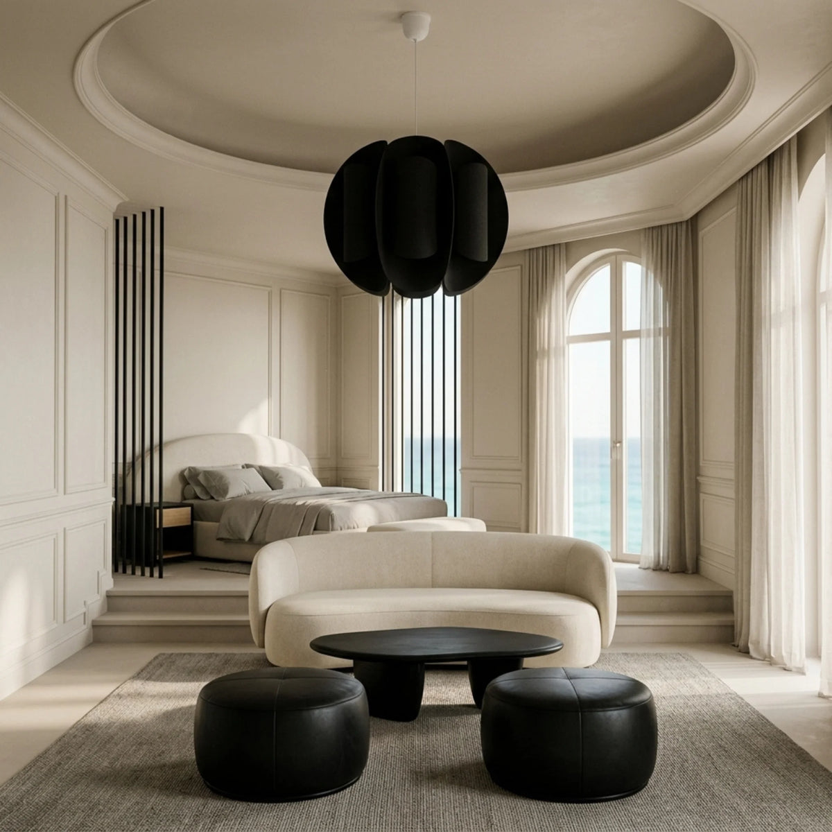 Suspension boule noire dans une chambre au plafond rond avec vue sur la mer